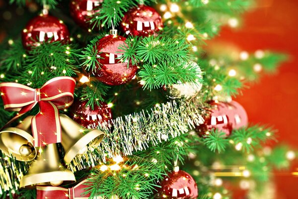 Christmas tree decorated with tinsel and bells