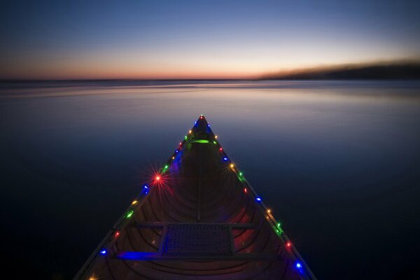 Minimalistic picture of a boat on the river