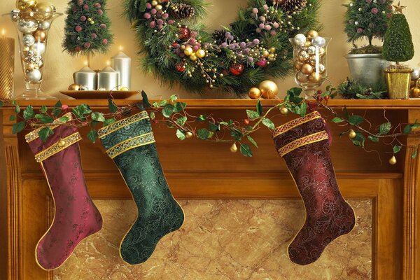 Christmas stockings for gifts on the fireplace