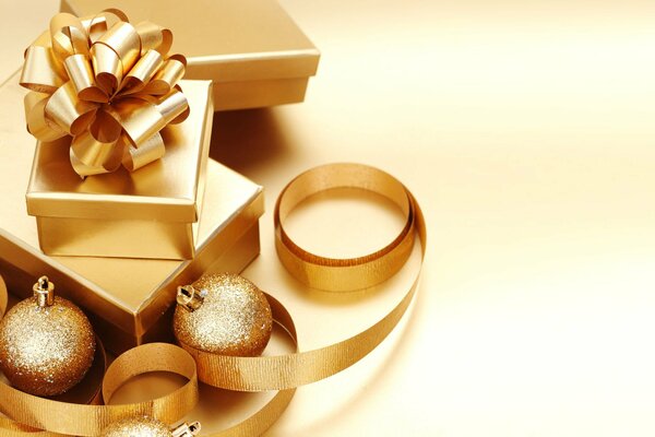 Christmas balls and gifts gold