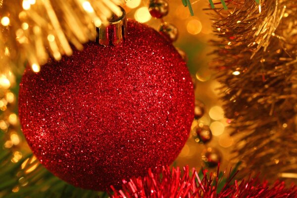 Red Christmas ball-decoration on the Christmas tree