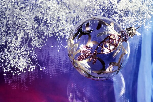 New Year s screensaver. Sequined glass ball