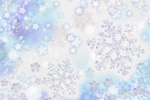 Shiny snowflakes on a blue and white background