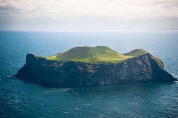 The island is green among the sea of blue