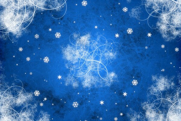Zimowe wzory i płatki śniegu na niebieskim tle