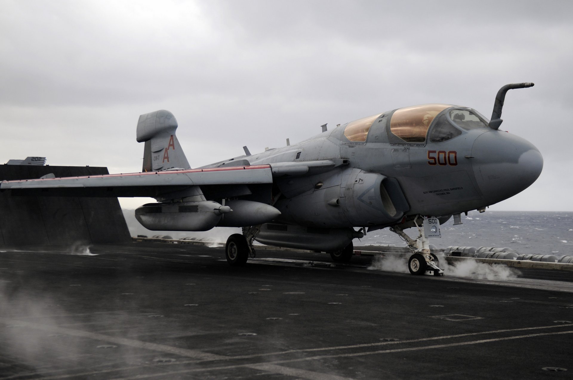 grumman ea-6b prowler carrier-based electronic warfare aircraft taking off from an aircraft carrier carl vinson cvn 70