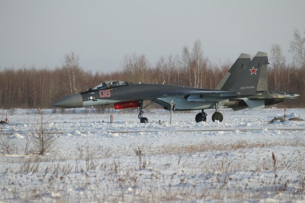 Russian fighter on the winter field