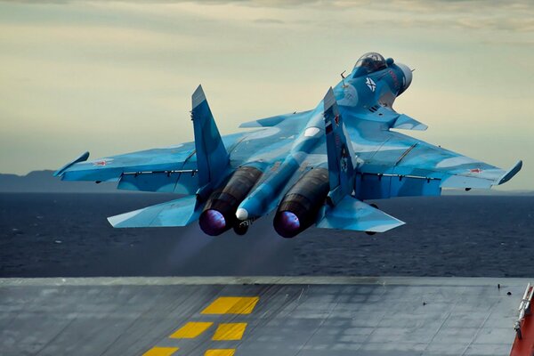 Russia s blue aircraft carrier takes off from the runway