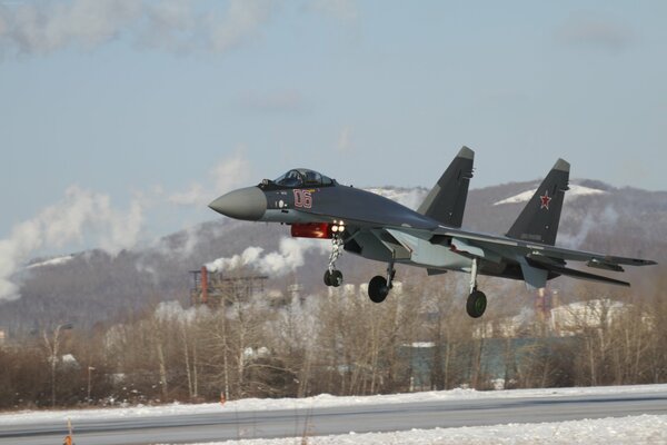 A Russian fighter jet makes a landing