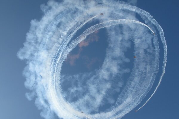 A round trail of planes in the sky