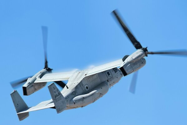 The helicopter of the US Armed Forces is gaining altitude