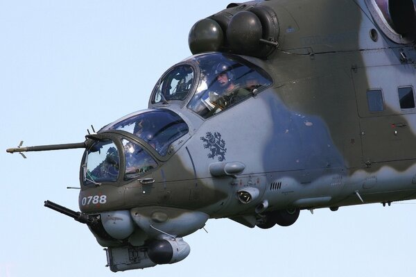 Mi-24V helicopter on board with pilots