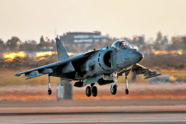 Harrier av-8b aircraft taking off from the airfield