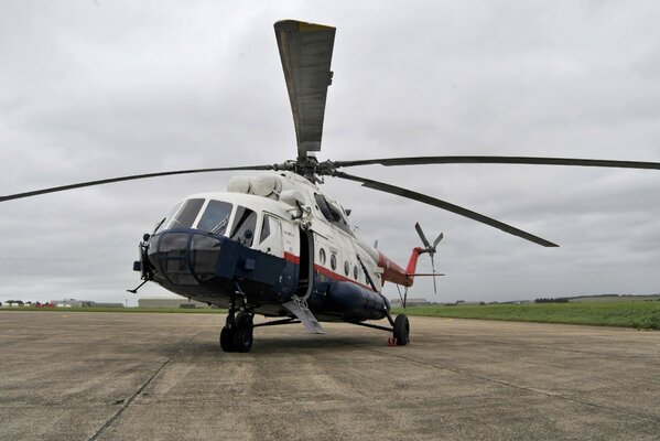 A large helicopter with huge blades