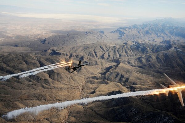 Rockwell b-1 lancer bombers over mountainous terrain