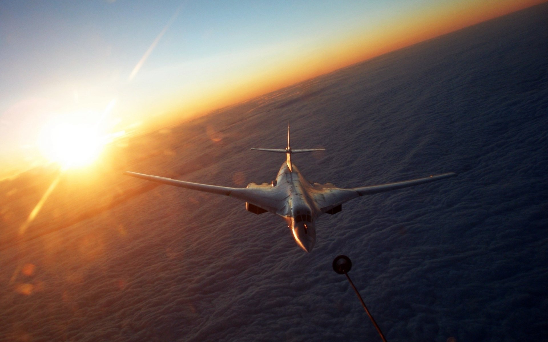 tu-160 plane sun clouds hose for refueling