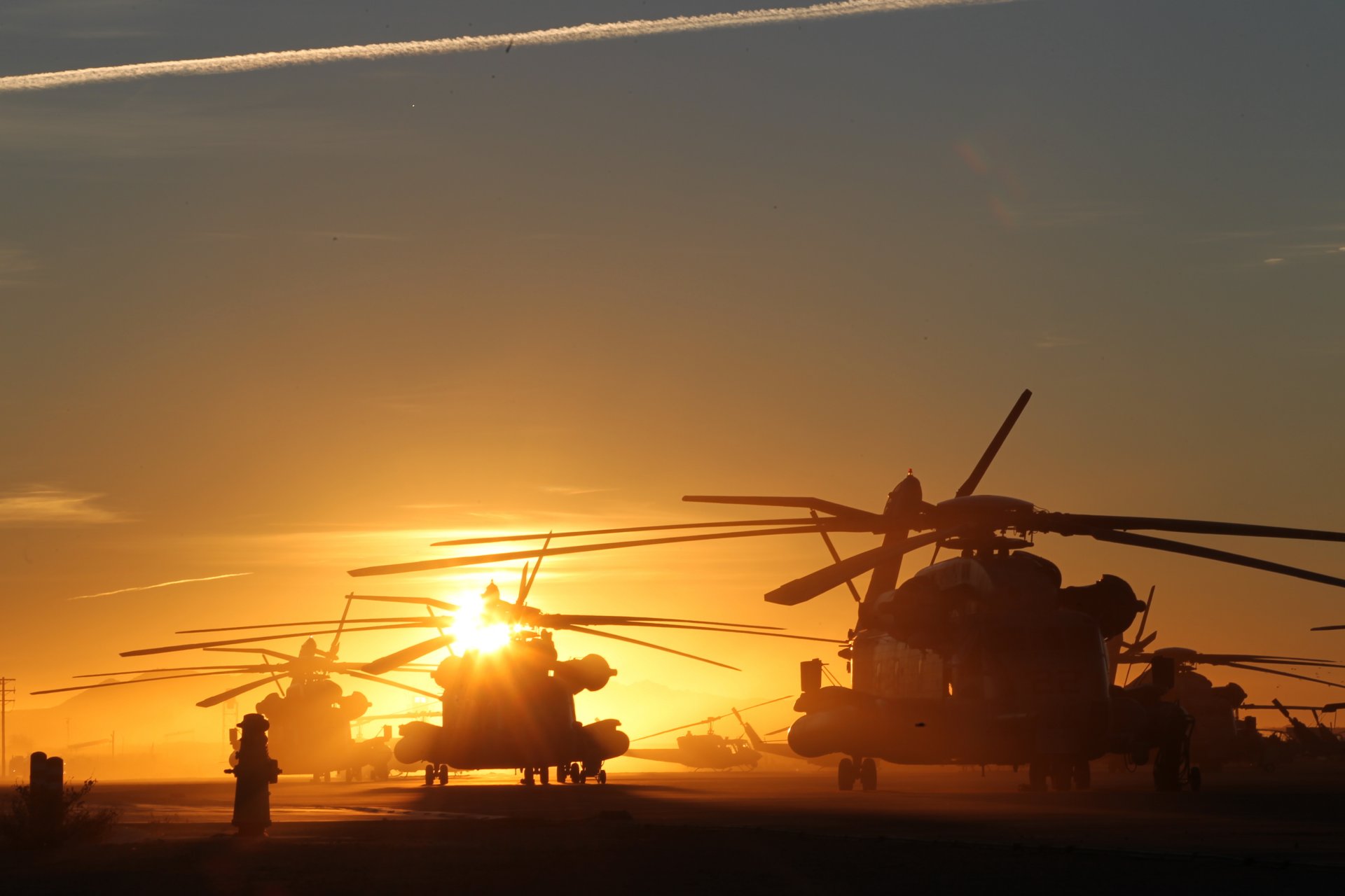 helicopters sunset sun