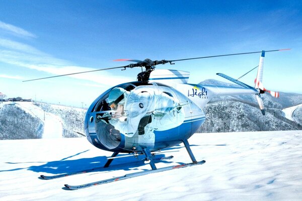 A picture of a helicopter standing on a winter background