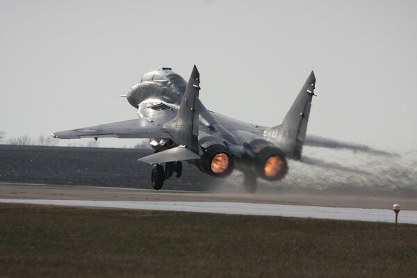 Multi-purpose MIG-29 fighter aircraft on takeoff