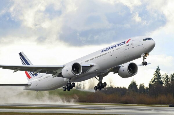 The take-off of a passenger liner into the sky