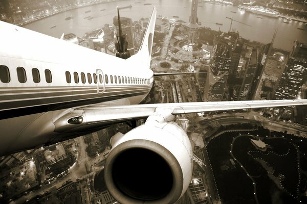 View of the city from the take-off plane from the engine side