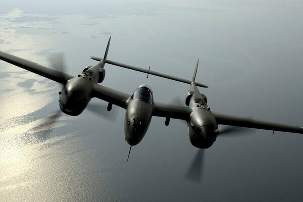 Two-bladed aircraft over the sea