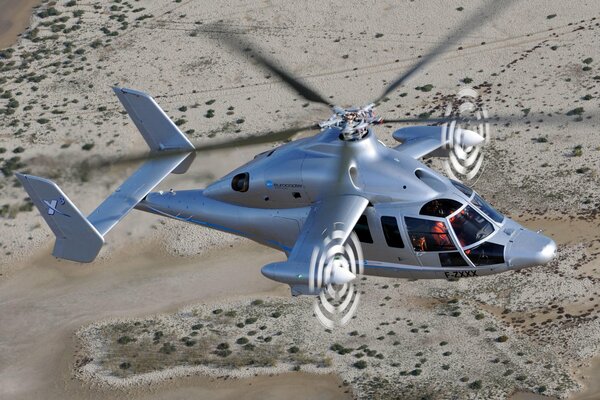 The flight of a rotorcraft over the desert