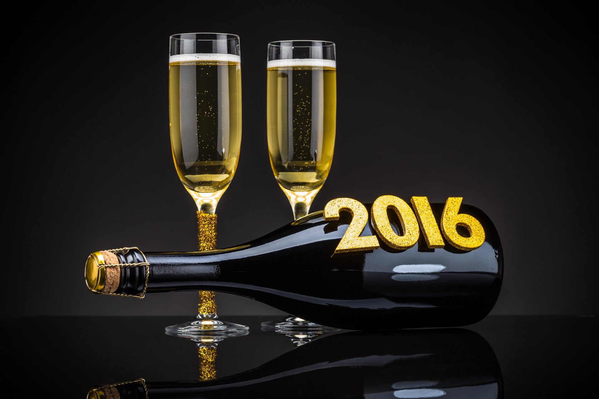 2016 felice anno nuovo oro champagne bottiglia bicchieri