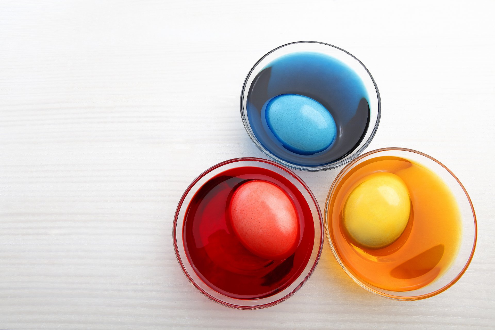 holidays easter eggs three red yellow blue photo