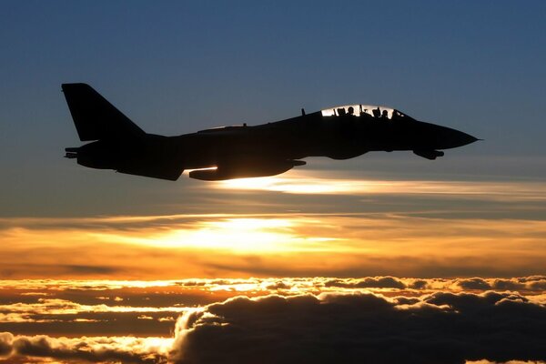 Flying in the clouds. Flight. At sunset level