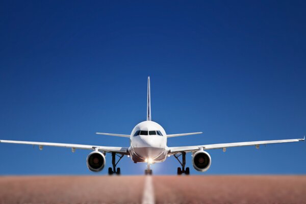 Acceleration of the aircraft against the blue sky