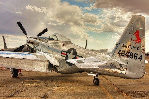 A tired plane is basking in the sun