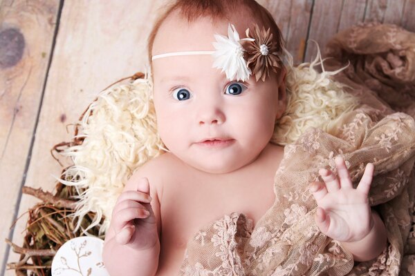 Charming newborn princess at the camera s eye