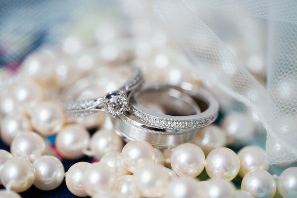 An engagement gift for a girl with pearls and ribbons