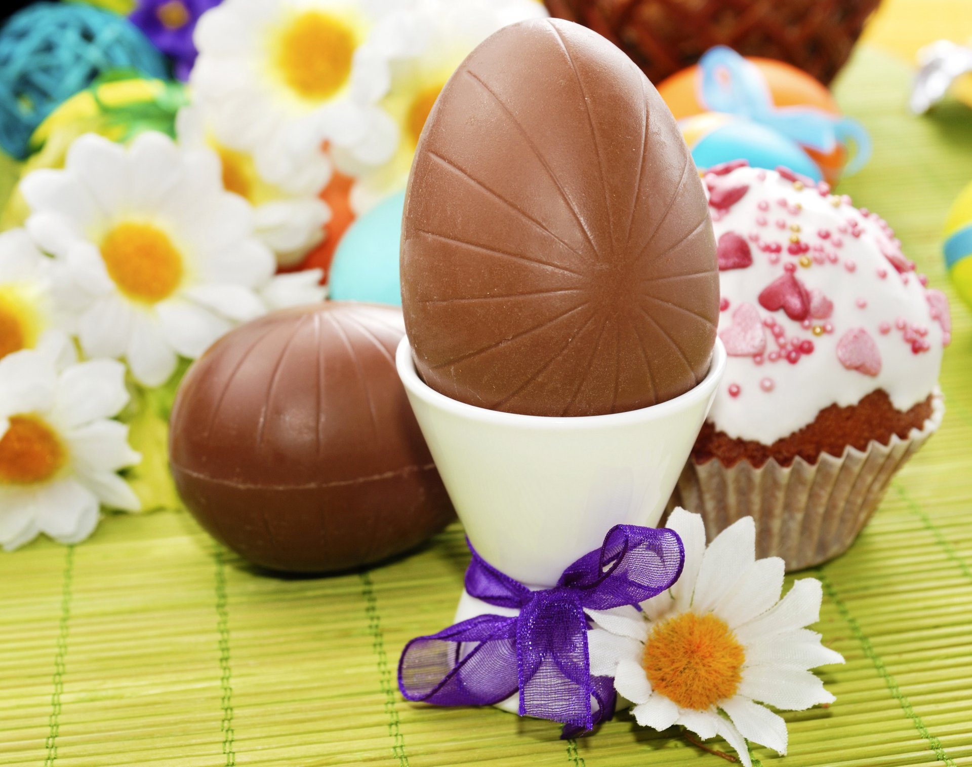 vacanze pasqua cioccolato margherite uova fiocco cibo foto