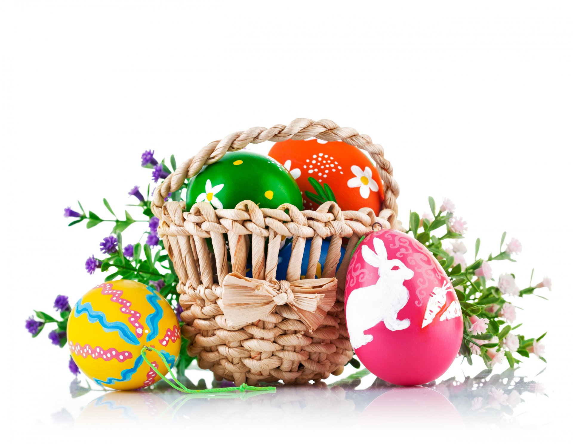 easter eggs basket flowers white background