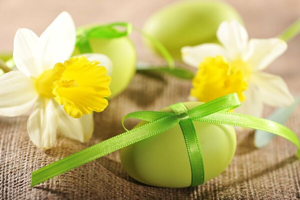 Decorating eggs with flowers for Easter