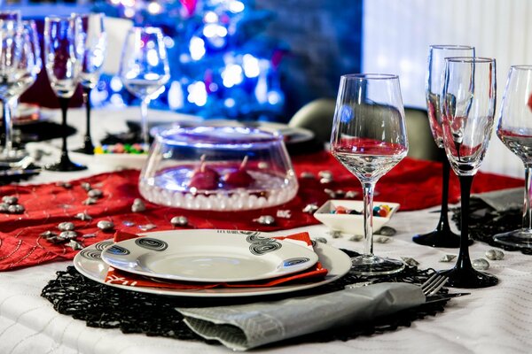 A set table with glasses and plates