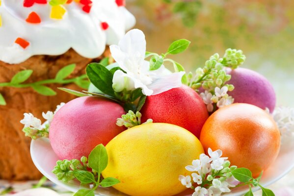 Multicolored eggs with Easter cake