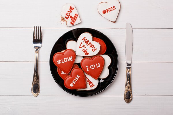 A plate with hearts on a wooden table