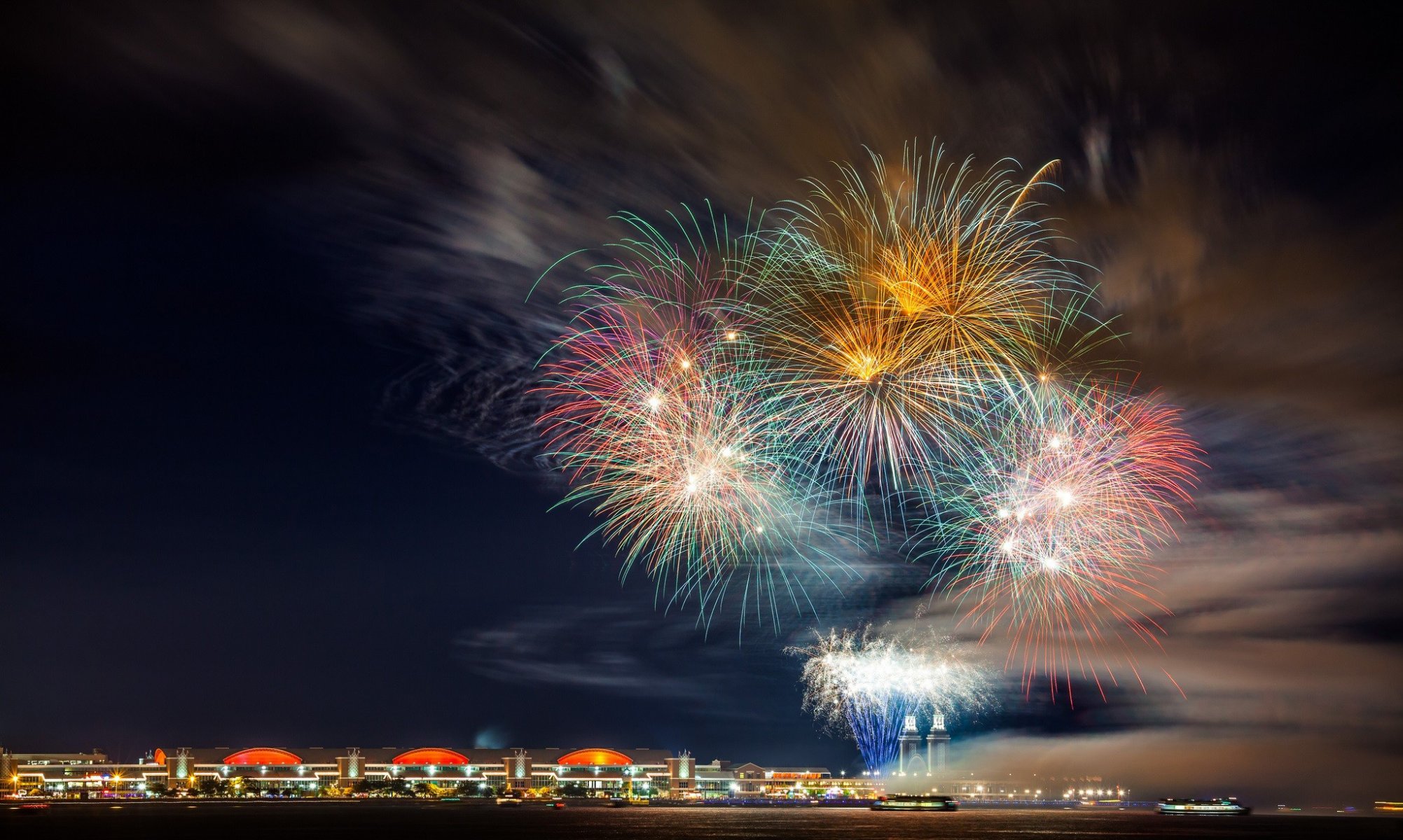 town night sky salute explosions fire flash