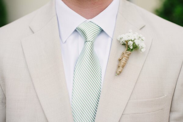 Groom s suit with flowers in the buttonhole