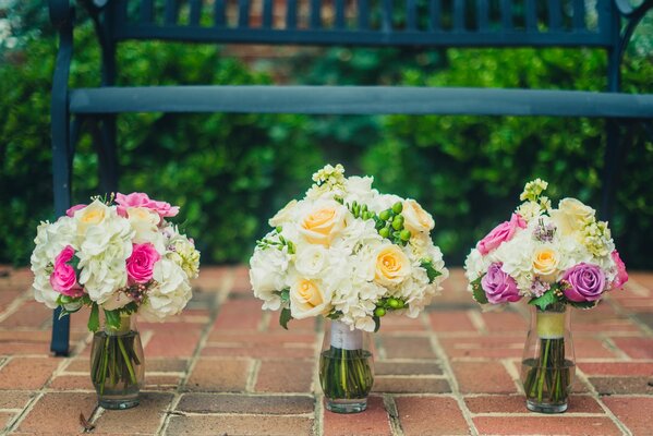 Three delicate wedding bouquets