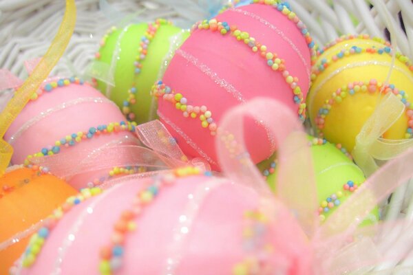 Festive Easter eggs with ribbons