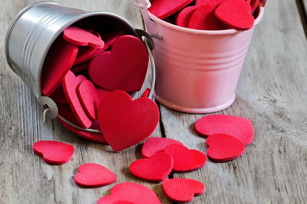 Little red hearts in a bucket