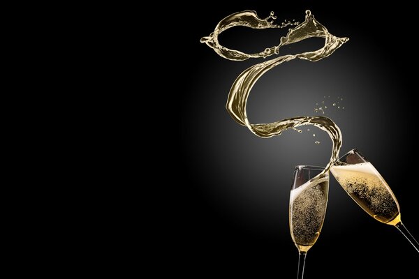 Two glasses of champagne and a splash