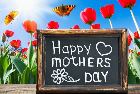 Congratulazioni per la mamma alla lavagna della scuola