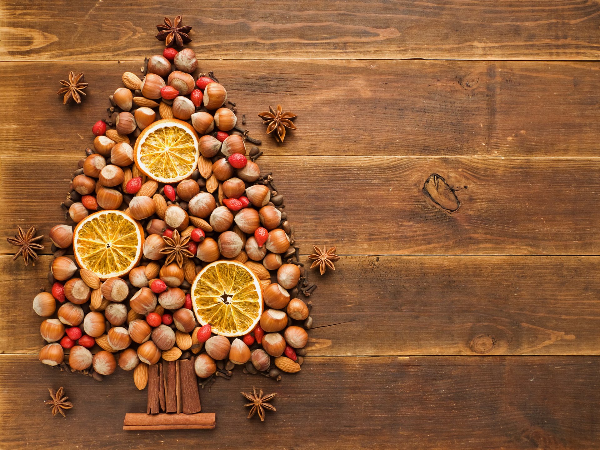 christmas tree almonds nuts forest cinnamon star anise carnation dog rose orange table tree holiday winter new year christma