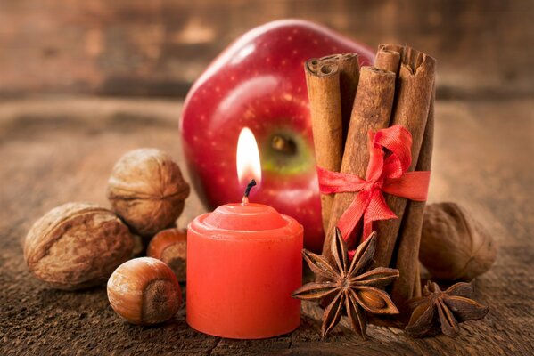 Beautiful landscape with an apple and a candle