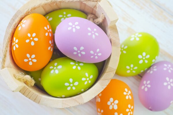 Easter eggs in a white flower